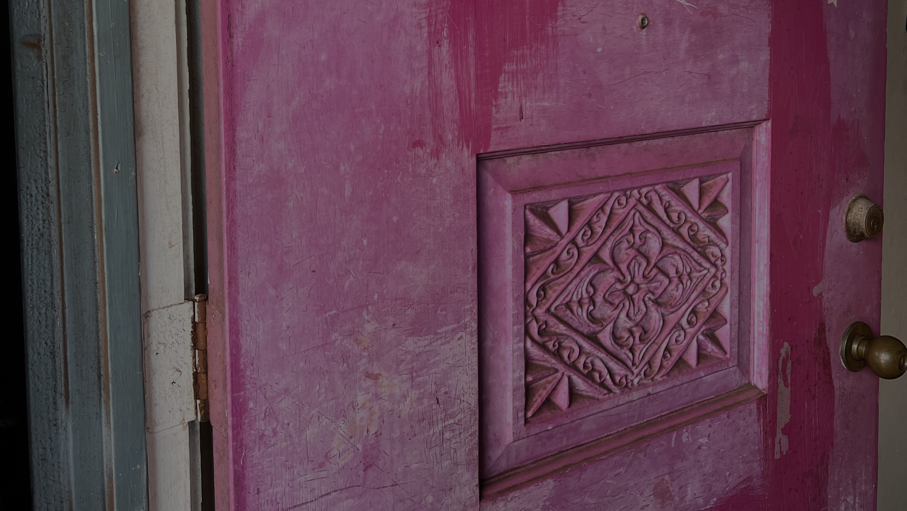 Cover photo of purple door entry